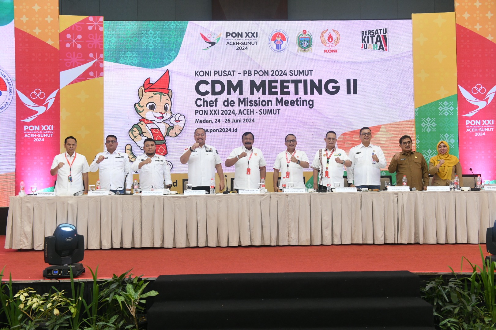 Panitia Besar Pekan Olahraga Nasional (PB PON) XXI 2024 Aceh-Sumut menggelar Chef de Mission (CdM) Meeting ke-2, di Ballroom Hotel Santika Premiere Dyandra, Jalan Kapten Maulana Lubis, Medan.