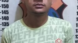 Pelaku yang diamankan pihak kepolisian.