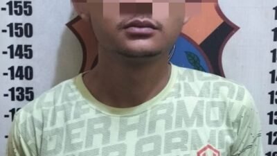 Pelaku yang diamankan pihak kepolisian.