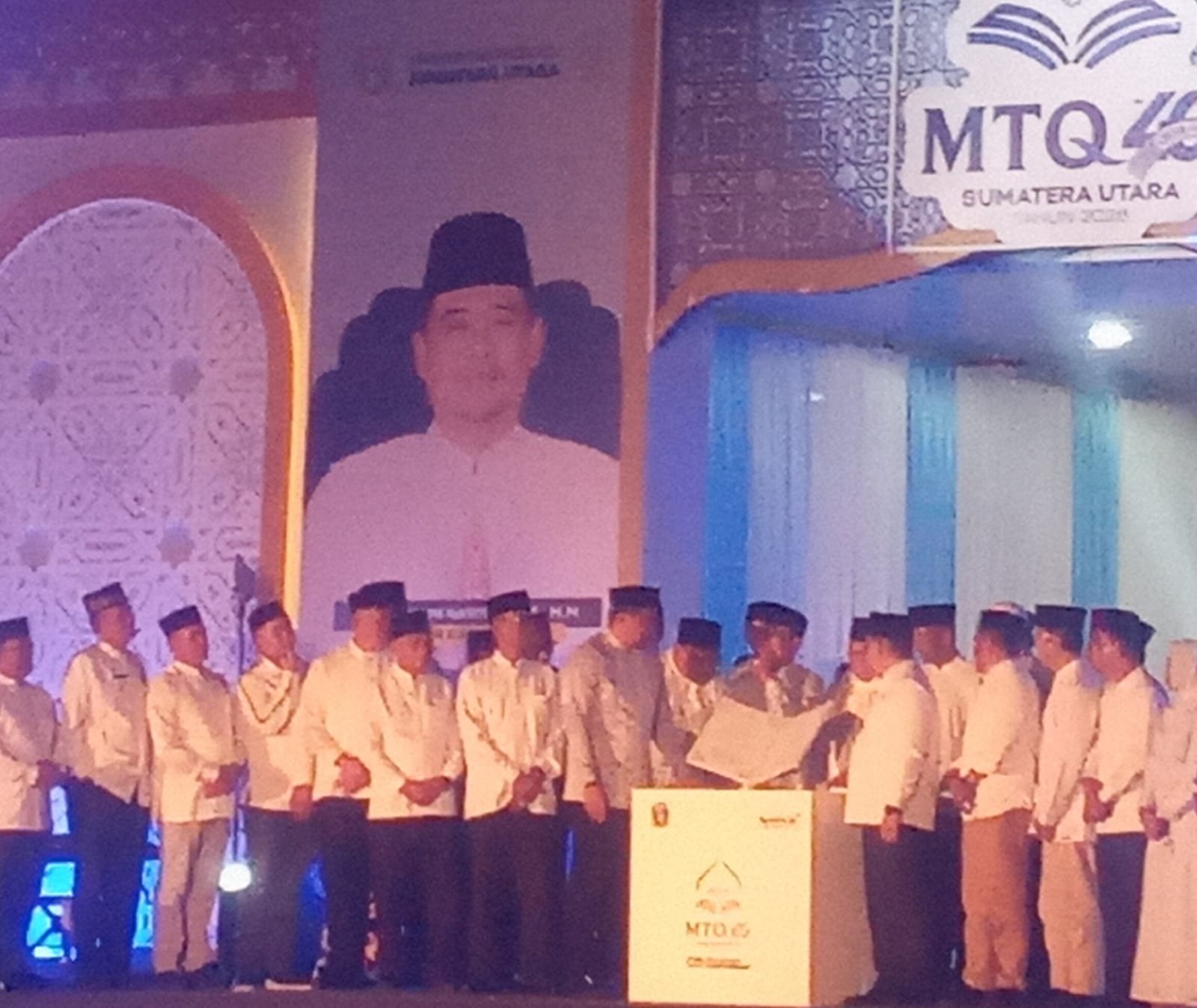 Wakil Menteri Agama RI Dr.K.H. Romo Raden Muhammad Syafi'i, SH, M.Hum membuka secara resmi MTQ ke 40 tingkat Sumatera Utara tahun 2026. Pembukaan MTQ ke 40 di tandai dengan terbukanya replika mushaf Al Qur'an. 